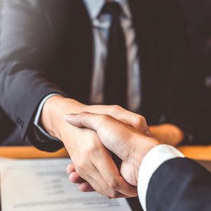 Shaking hands Business people greeting new colleagues while job interviewing shaking hands meeting Planning after during job interview Concept